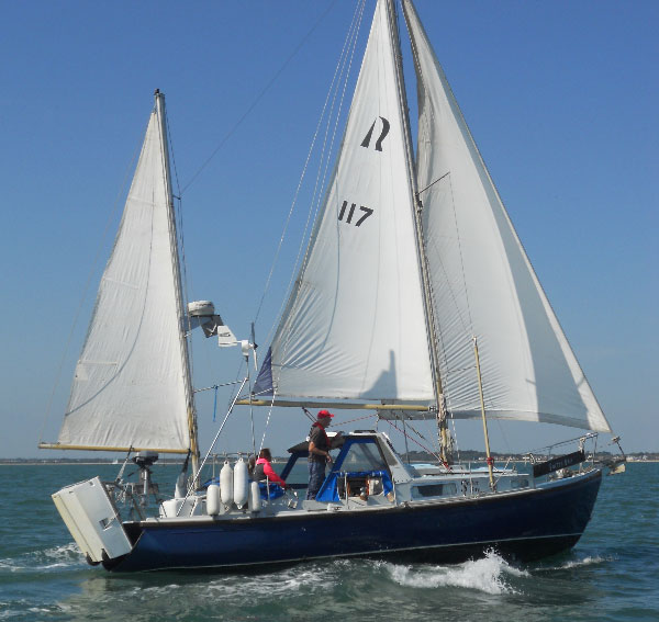 A yacht under sail, no fender hooks though!